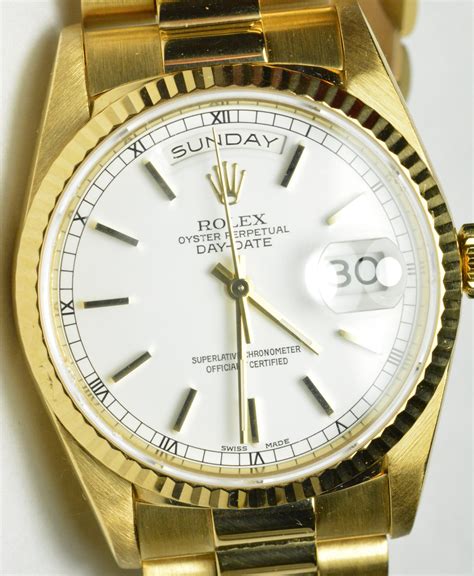 gold stripe rolex watch|Rolex gold watches.